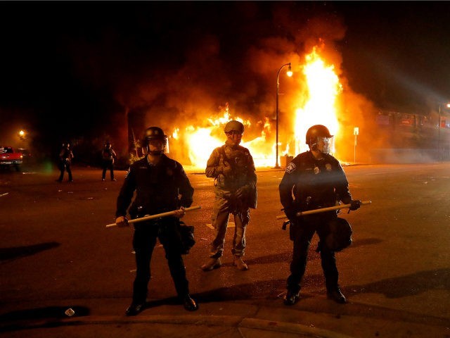 Click image for larger version

Name:	Police-guard-against-protesters-fire-background-Minneapolis-George-Floyd-riot-ap-640x480.jpg
Views:	43
Size:	56.7 KB
ID:	498977